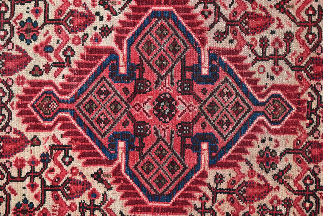 red Accent rug 2' 8" x 4' 1"