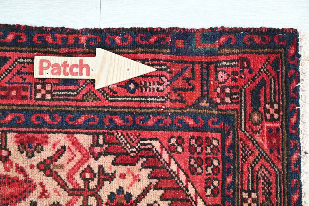 red Accent rug 2' 8" x 4' 1"