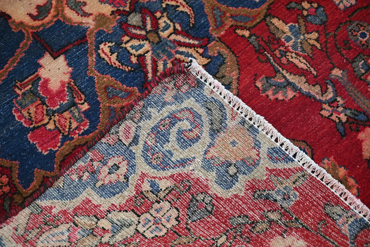 red Accent rug 3' 2" x 6' 0"