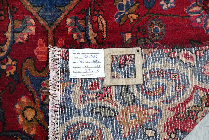 red Accent rug 3' 2" x 6' 0"