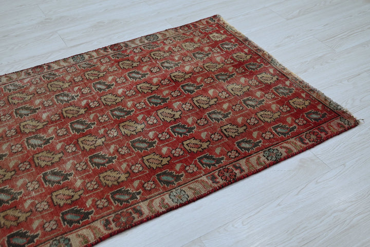 red Accent rug 2' 10" x 4' 2"