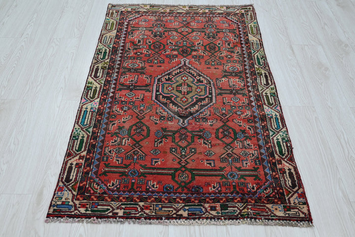 red Accent rug 2' 9" x 4' 5"