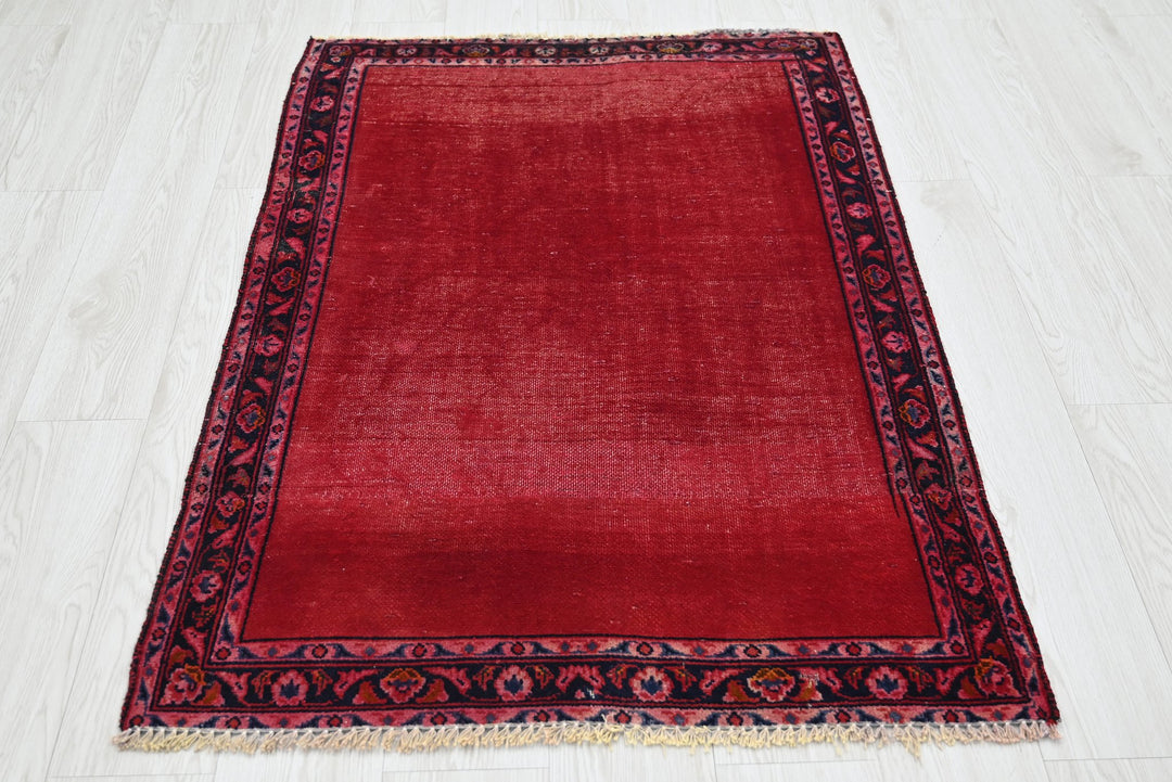 red Accent rug 2' 10" x 4' 1"