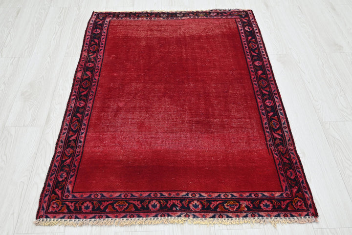 red Accent rug 2' 10" x 4' 1"
