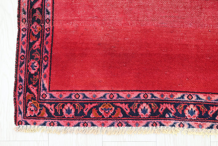 red Accent rug 2' 10" x 4' 1"
