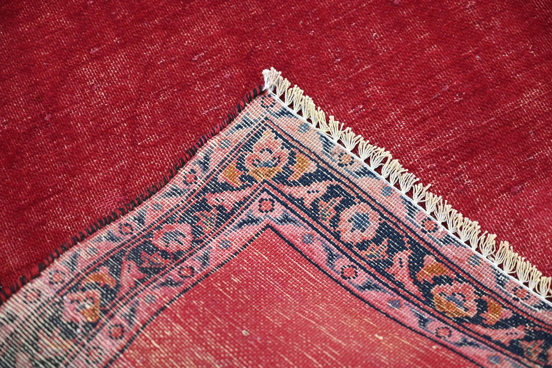red Accent rug 2' 10" x 4' 1"