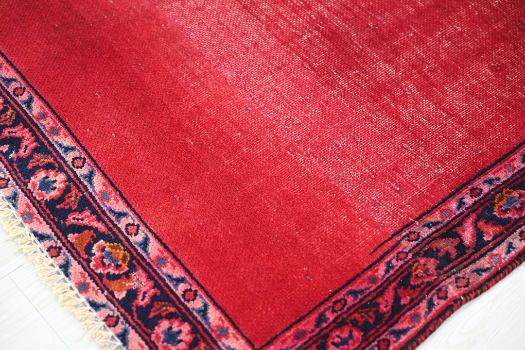 red Accent rug 2' 10" x 4' 1"