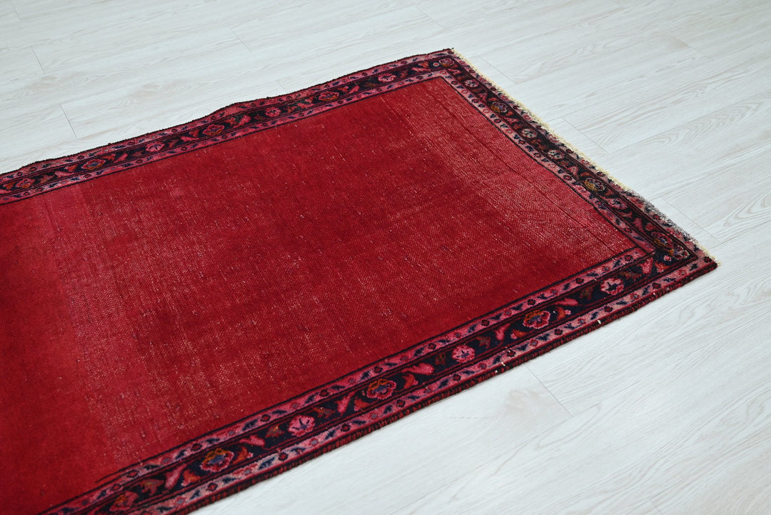 red Accent rug 2' 10" x 4' 1"