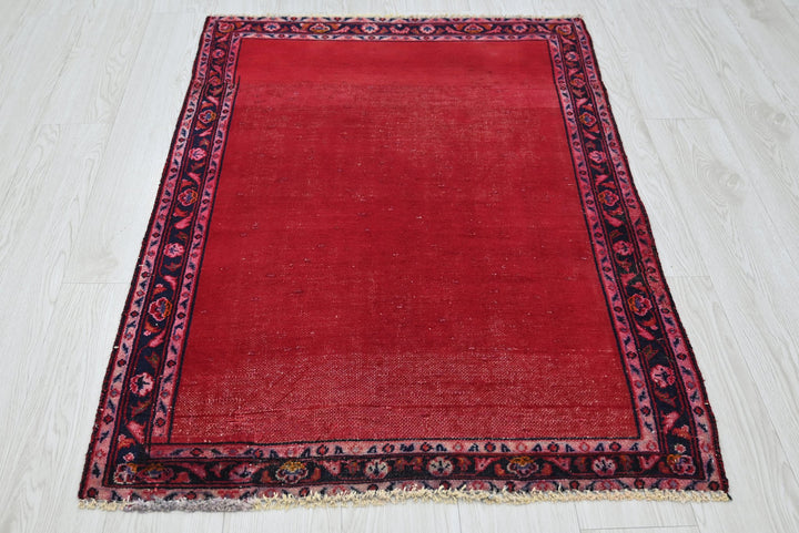 red Accent rug 2' 10" x 4' 1"