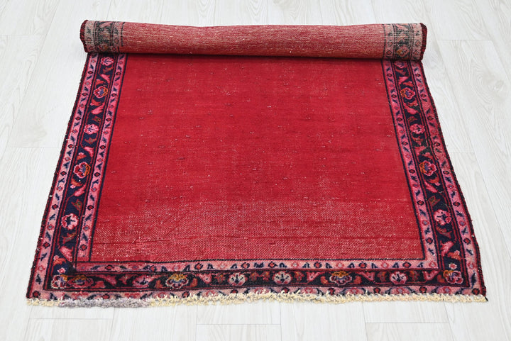 red Accent rug 2' 10" x 4' 1"