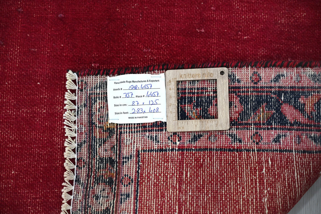 red Accent rug 2' 10" x 4' 1"