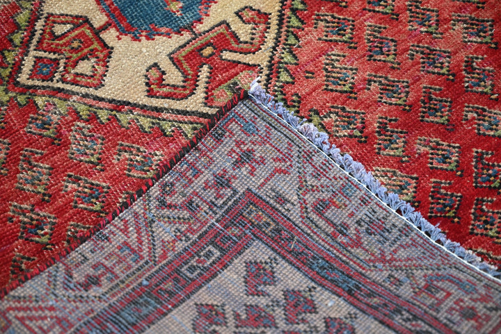 red Accent rug 2' 10" x 4' 9"