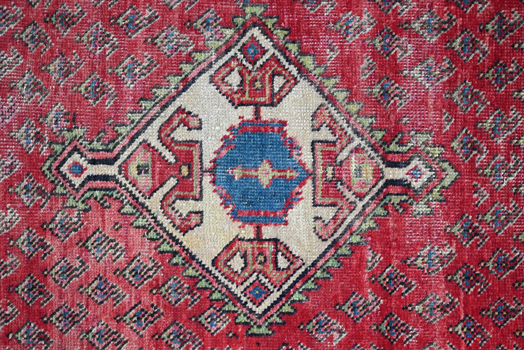 red Accent rug 2' 10" x 4' 9"