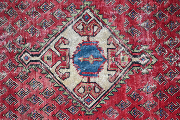 red Accent rug 2' 10" x 4' 9"