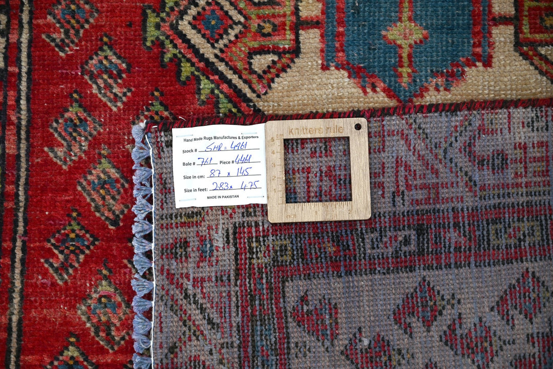 red Accent rug 2' 10" x 4' 9"