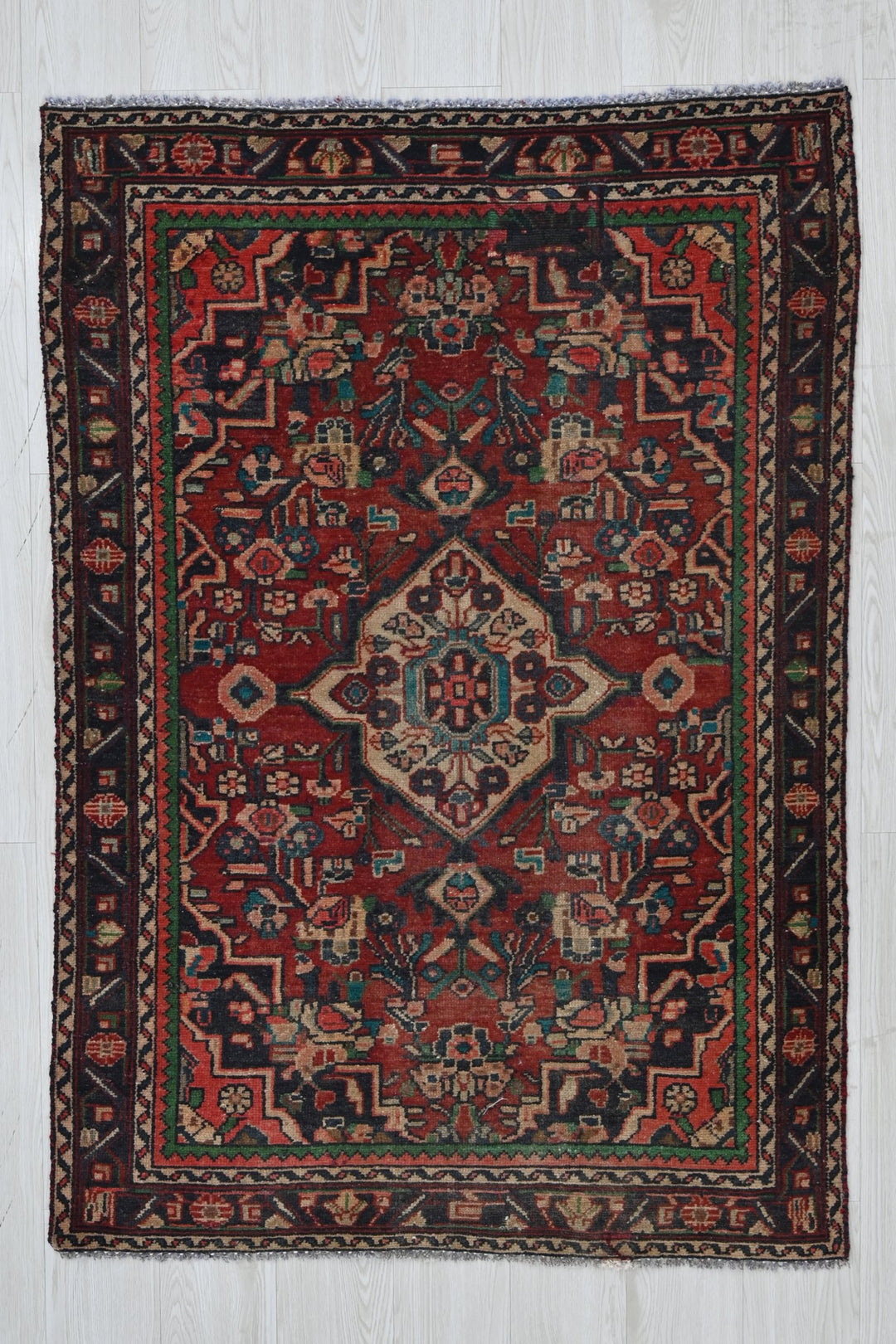 red Accent rug 3' 4" x 4' 7"