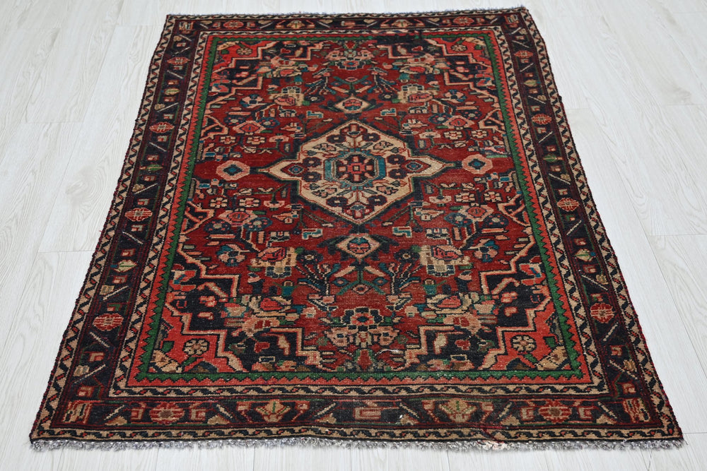 red Accent rug 3' 4" x 4' 7"