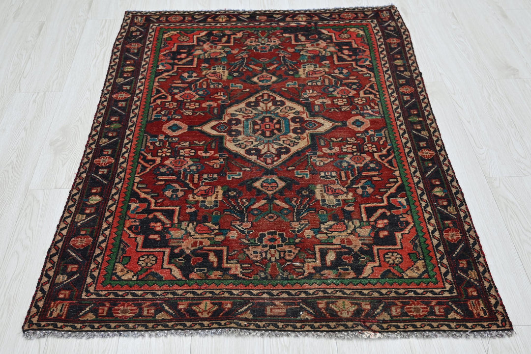 red Accent rug 3' 4" x 4' 7"