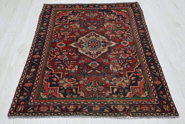 red Accent rug 3' 4" x 4' 7"