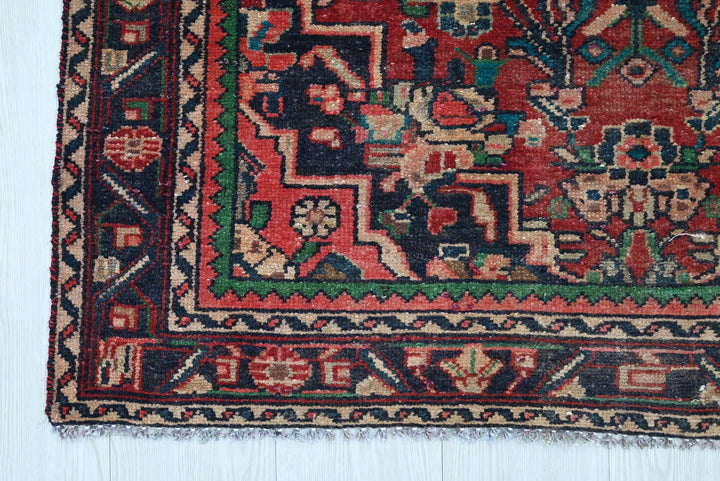 red Accent rug 3' 4" x 4' 7"