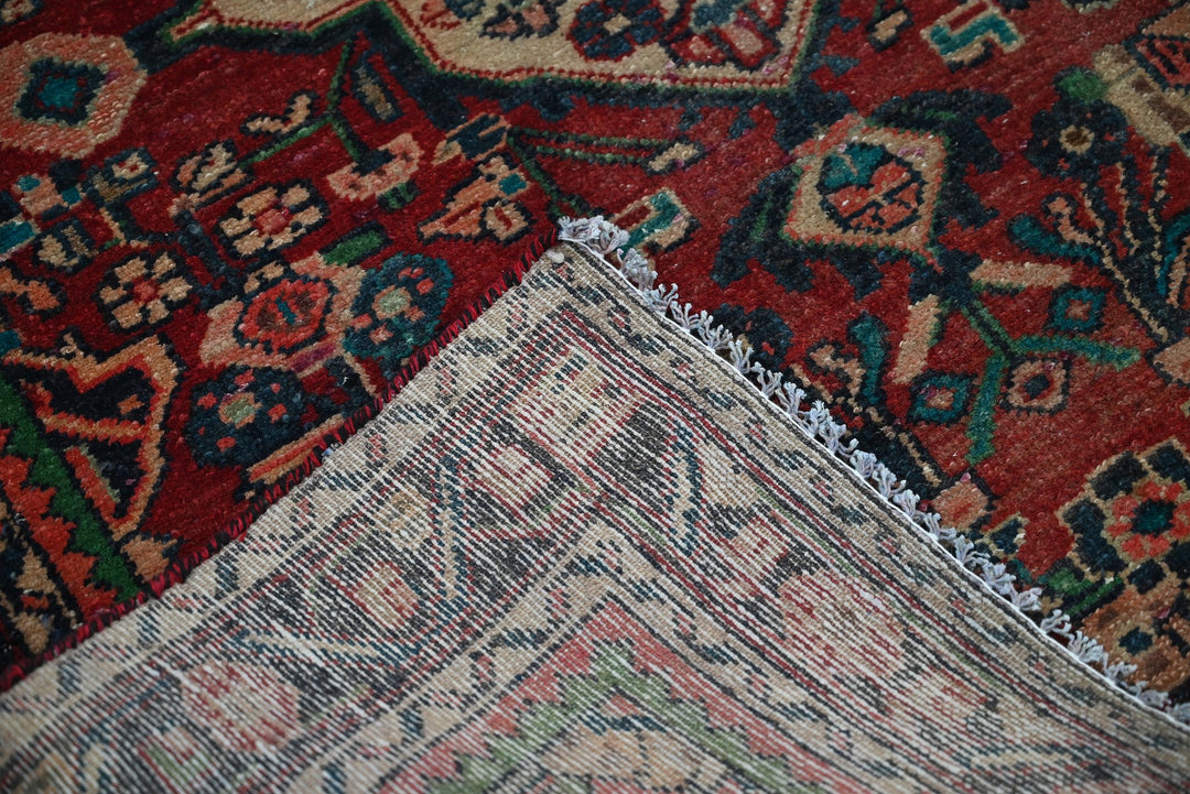 red Accent rug 3' 4" x 4' 7"