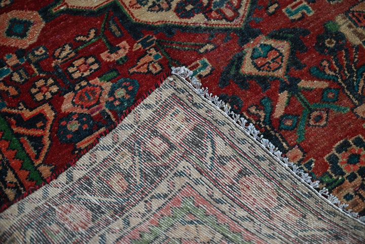 red Accent rug 3' 4" x 4' 7"