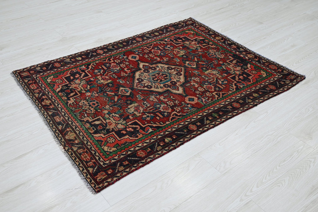 red Accent rug 3' 4" x 4' 7"