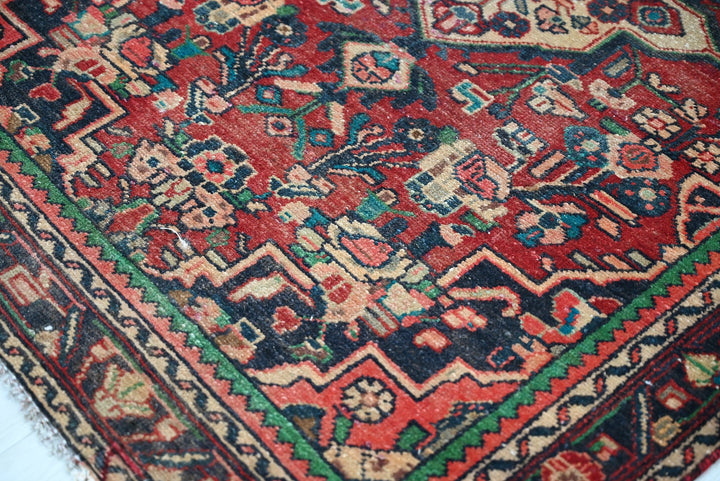 red Accent rug 3' 4" x 4' 7"