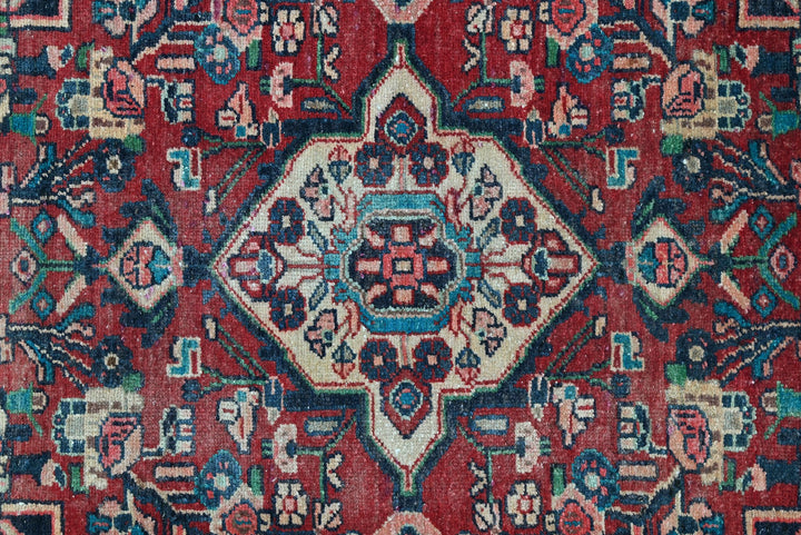 red Accent rug 3' 4" x 4' 7"