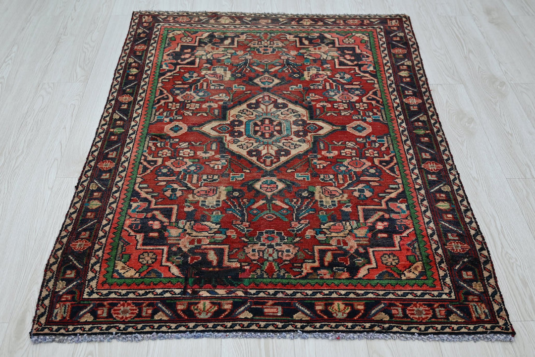 red Accent rug 3' 4" x 4' 7"