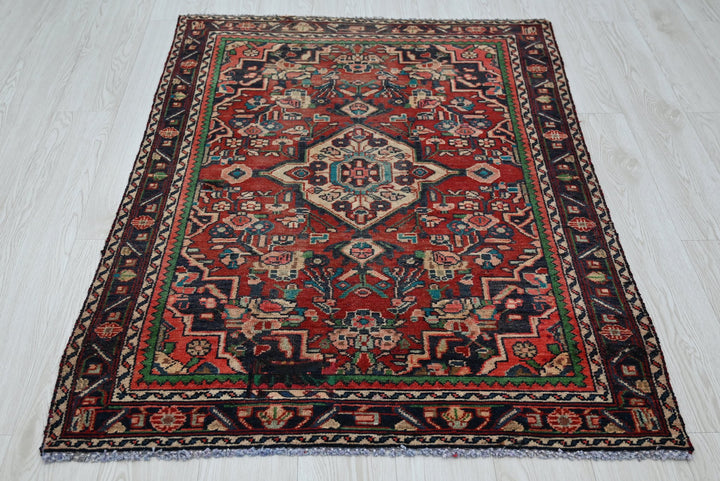 red Accent rug 3' 4" x 4' 7"