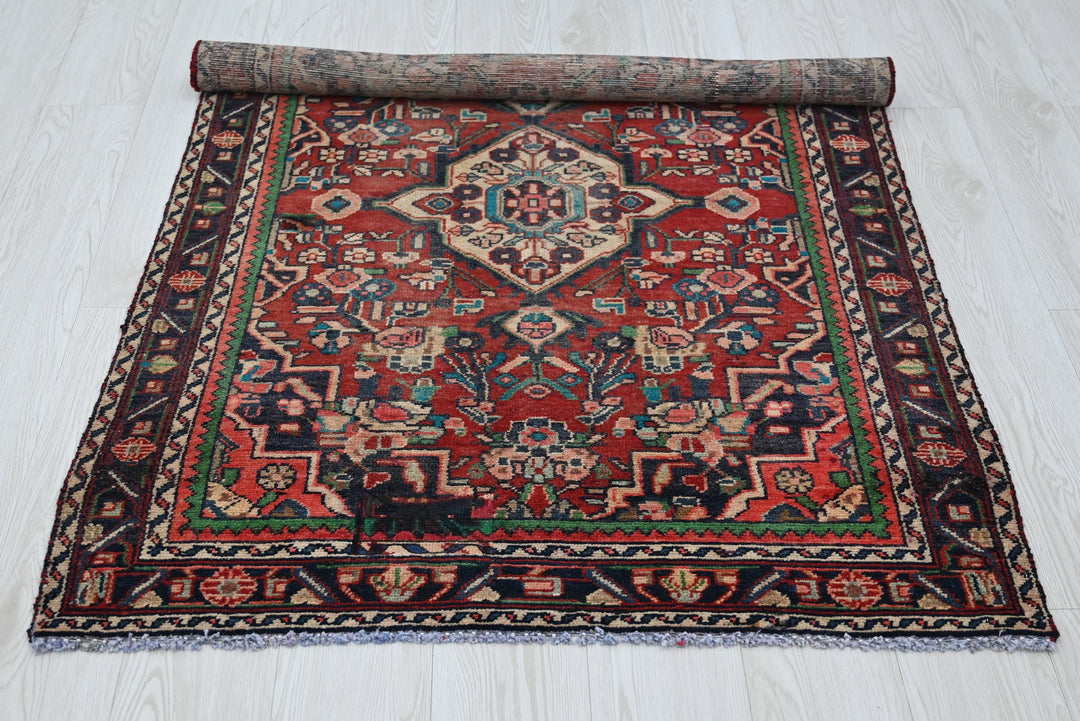 red Accent rug 3' 4" x 4' 7"