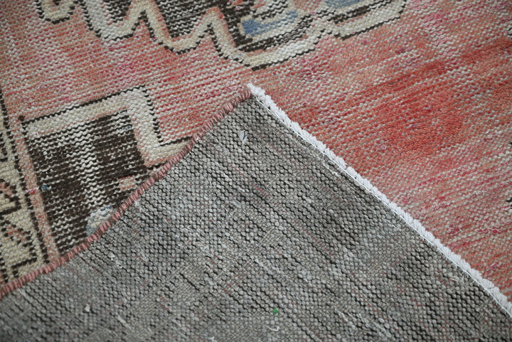 red Accent rug 3' 1" x 6' 2"