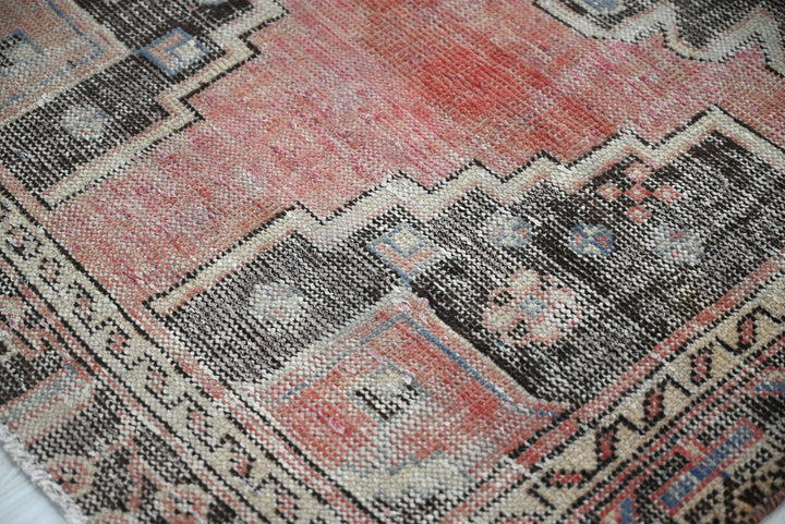 red Accent rug 3' 1" x 6' 2"