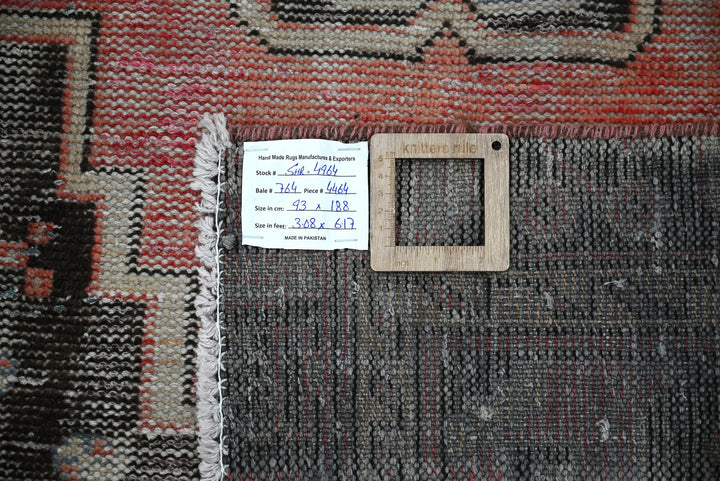 red Accent rug 3' 1" x 6' 2"