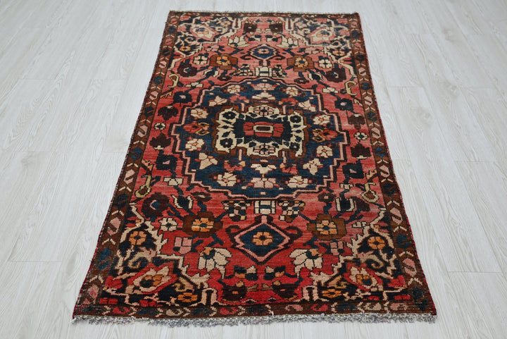 red Accent rug 3' 0" x 5' 7"