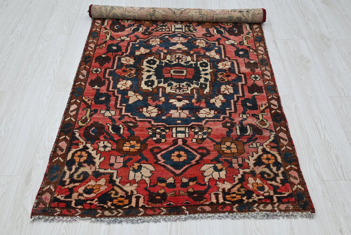 red Accent rug 3' 0" x 5' 7"