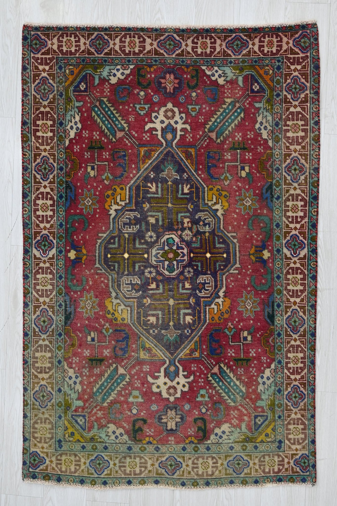 red Accent rug 3' 4" x 5' 4"