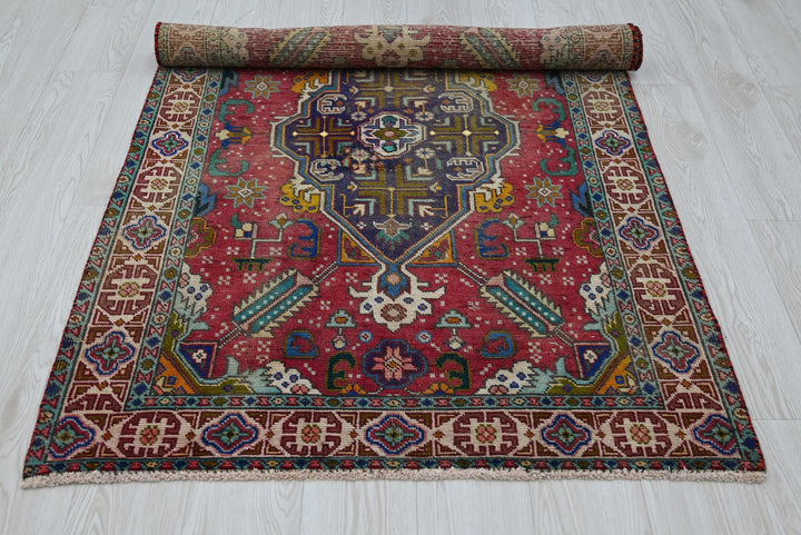 red Accent rug 3' 4" x 5' 4"