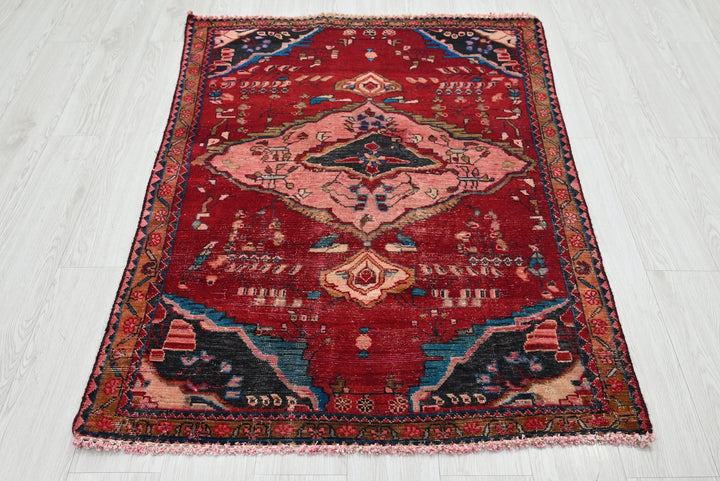 red Accent rug 3' 3" x 4' 10"