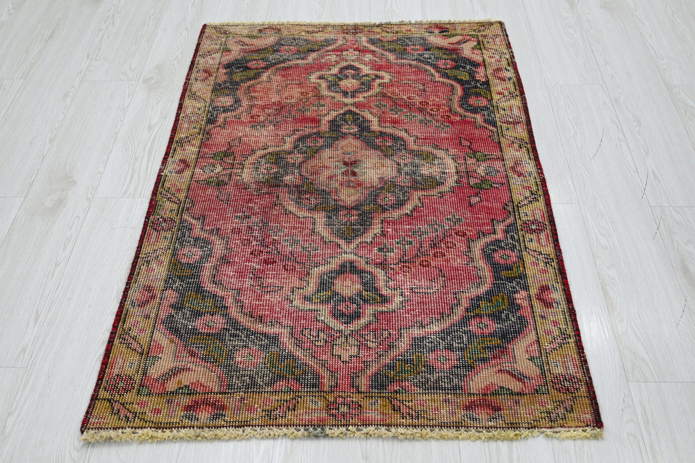 red Accent rug 2' 10" x 4' 4"