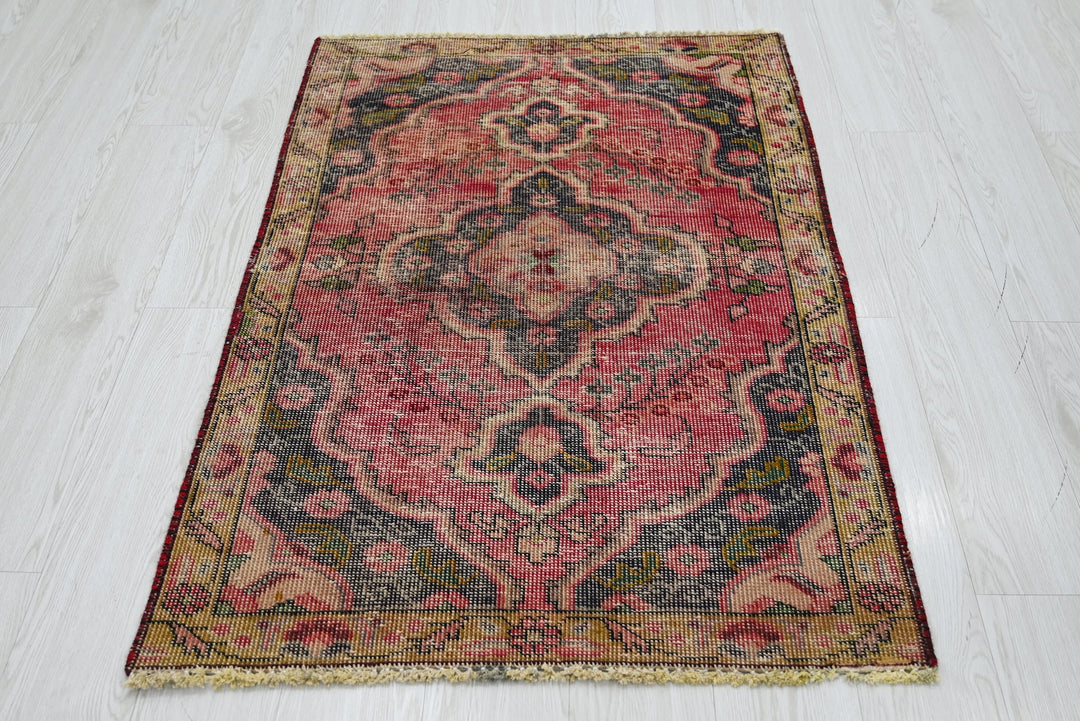 red Accent rug 2' 10" x 4' 4"