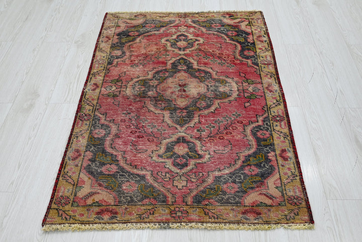 red Accent rug 2' 10" x 4' 4"