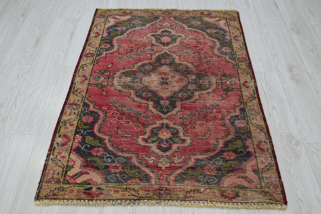 red Accent rug 2' 10" x 4' 4"