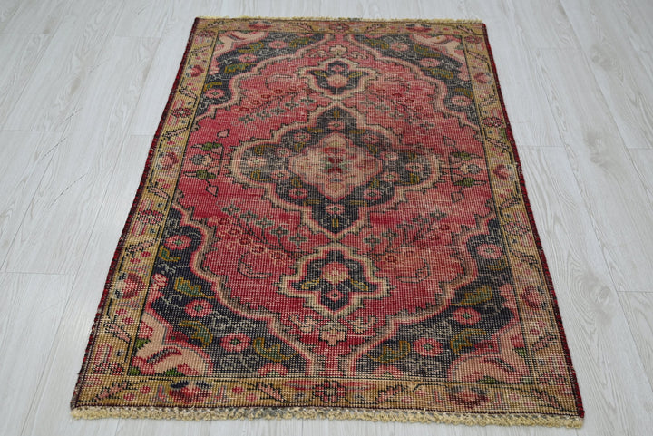 red Accent rug 2' 10" x 4' 4"