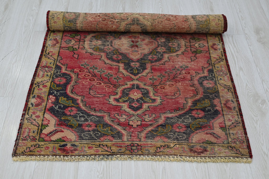 red Accent rug 2' 10" x 4' 4"