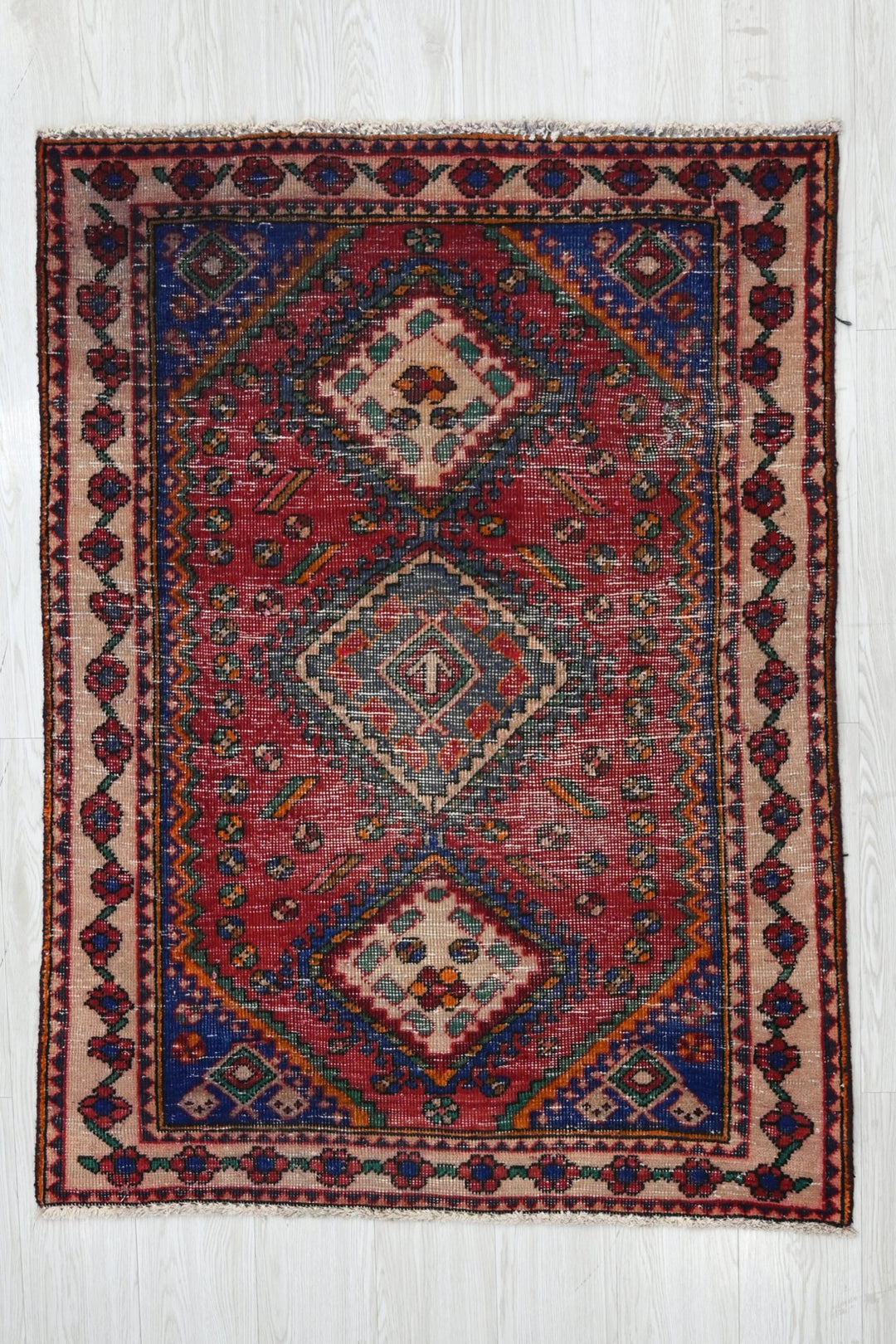 red Accent rug 3' 2" x 4' 3"