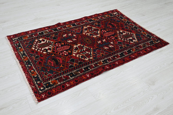 red Accent rug 3' 3" x 5' 0"