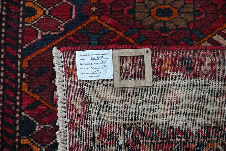 red Accent rug 3' 3" x 5' 0"