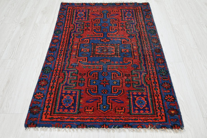 red Accent rug 2' 11" x 4' 4"